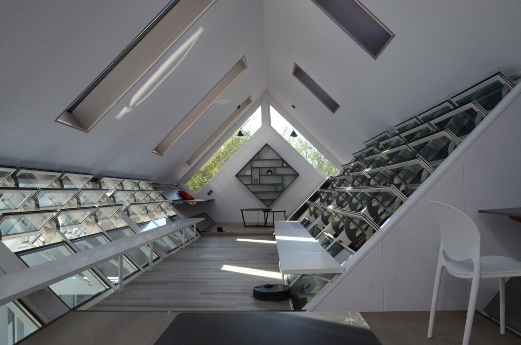 Interior attic space with PCM wall storage in a zero-carbon house